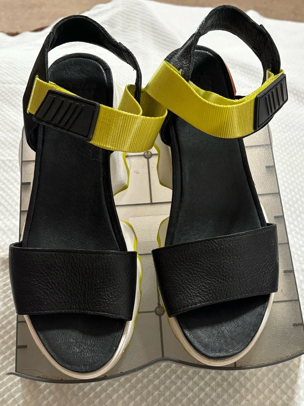 Sorel Black Platform Sandals with Yellow Straps